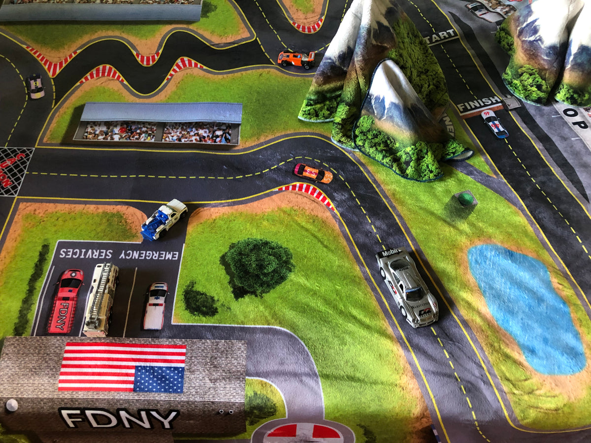 Kids 3D blanket with racetrack and emergency services,  design for toddlers and children.

best gift , best toy, trending toys, blanket, best kid's blanket, unique toy, 3 dimensional blankets,  three dimensional blanket, softest blanket, best gift ever, holiday gift, best present, birthday gift, Christmas gift, Chanukah gift, special memory, a blanket and a toy, boy playing on ed, boy playing with his blanket,, racetrack blanket, childhood memories