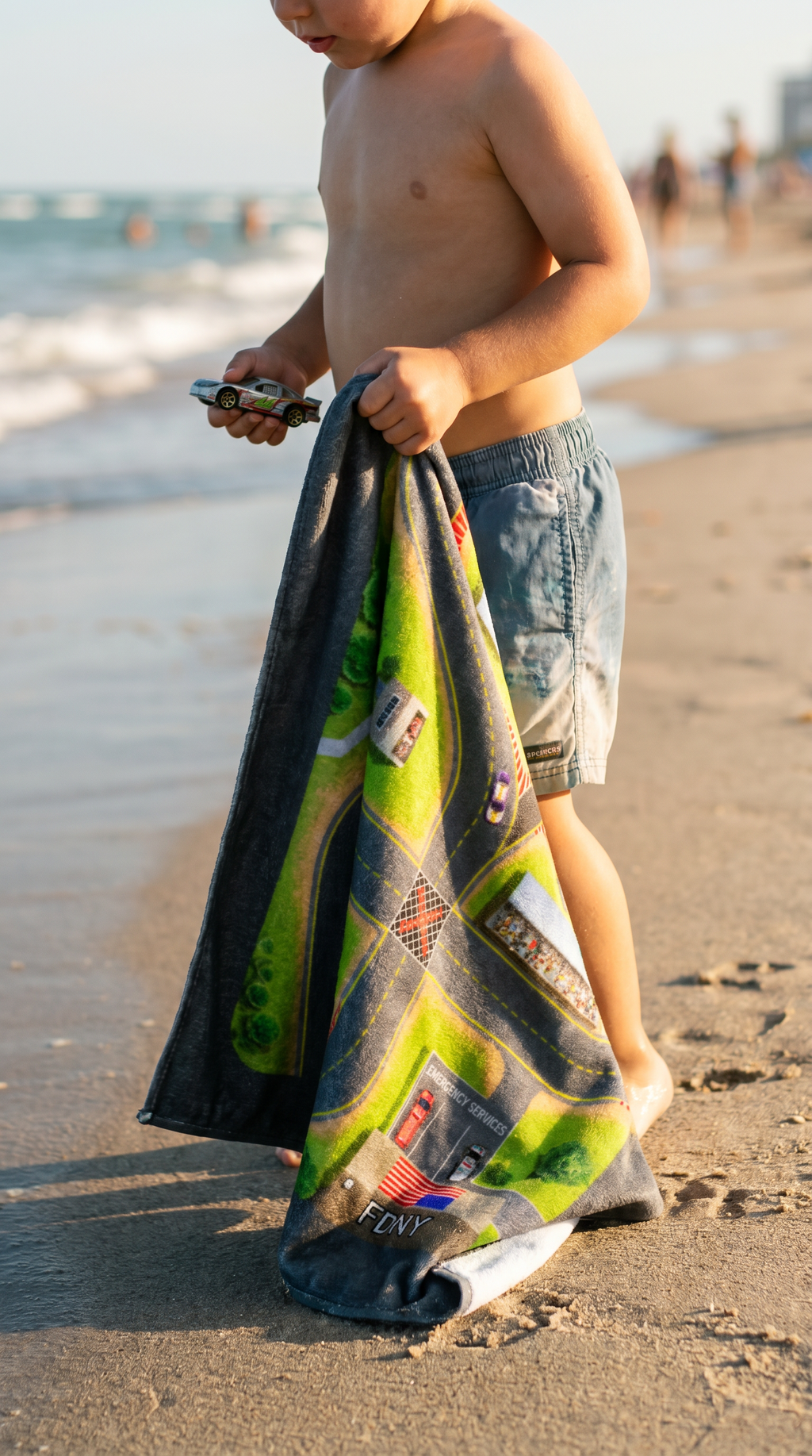 taking a racetrack play towel on the beach