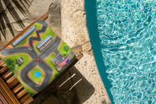 Load image into Gallery viewer, Towel-Pal™ at the Race Track (37" × 22")